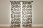 Decorative floral and baroque damask pattern on a beige background with Brown design on curtain panels