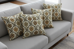 Decorative fabric with intricate Green floral pattern on a beige background on furniture