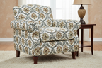 Decorative fabric with intricate Rust floral pattern on a beige background on furniture